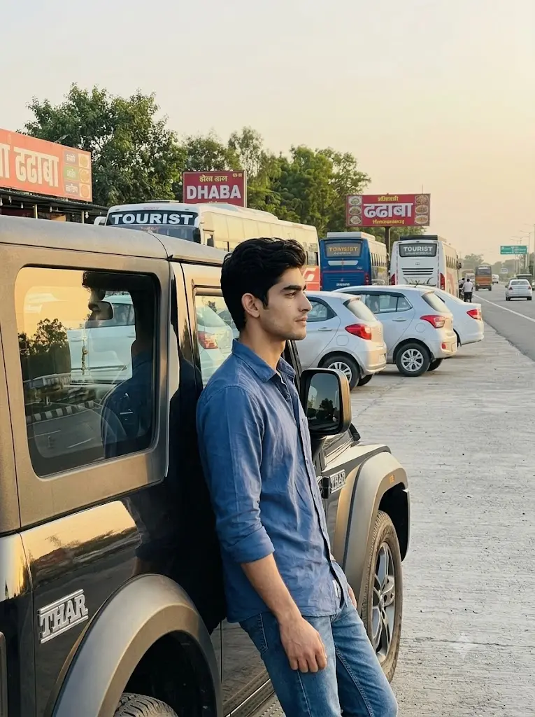 Mahindra Thar parked at a highway restaurant with a realistic male portrait generated using a Gemini AI prompt.